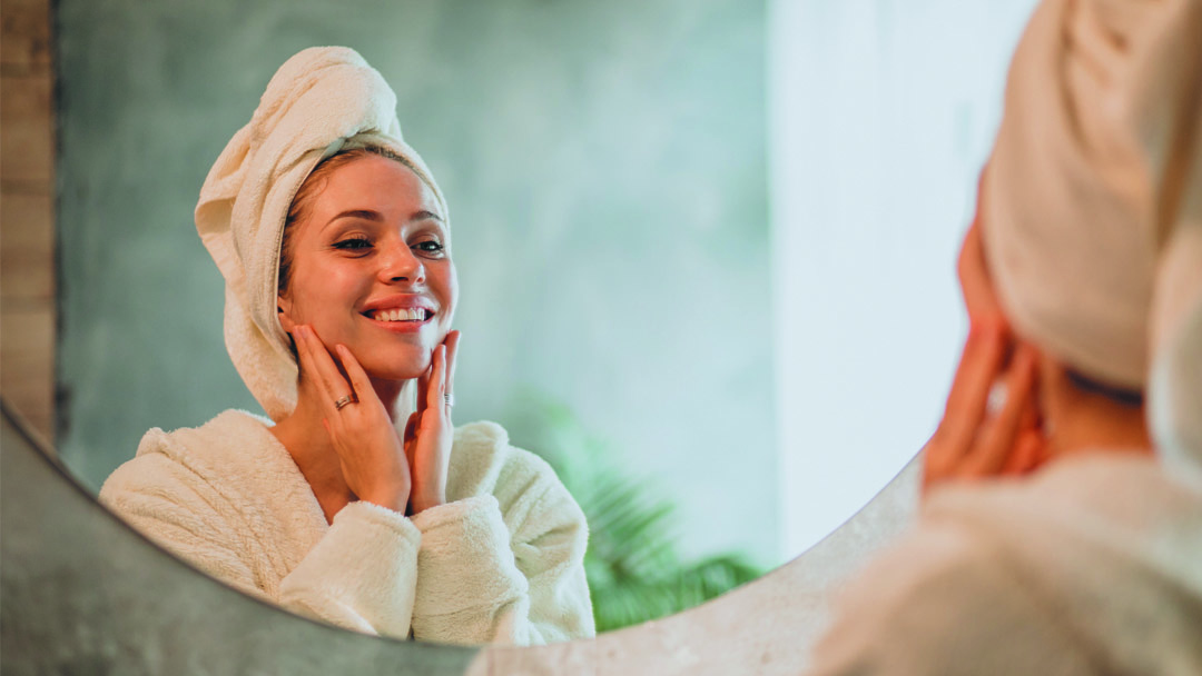 side-view-female-friends-applying-beauty-product - The Skin Suite Skin Care in Richmond, KY