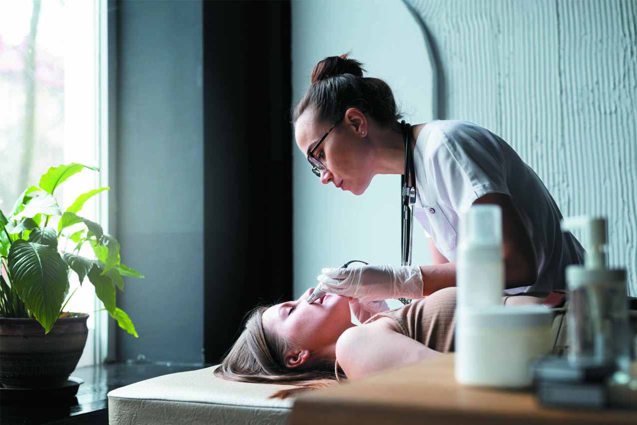 side-view-female-friends-applying-beauty-product - The Skin Suite Skin Care in Richmond, KY